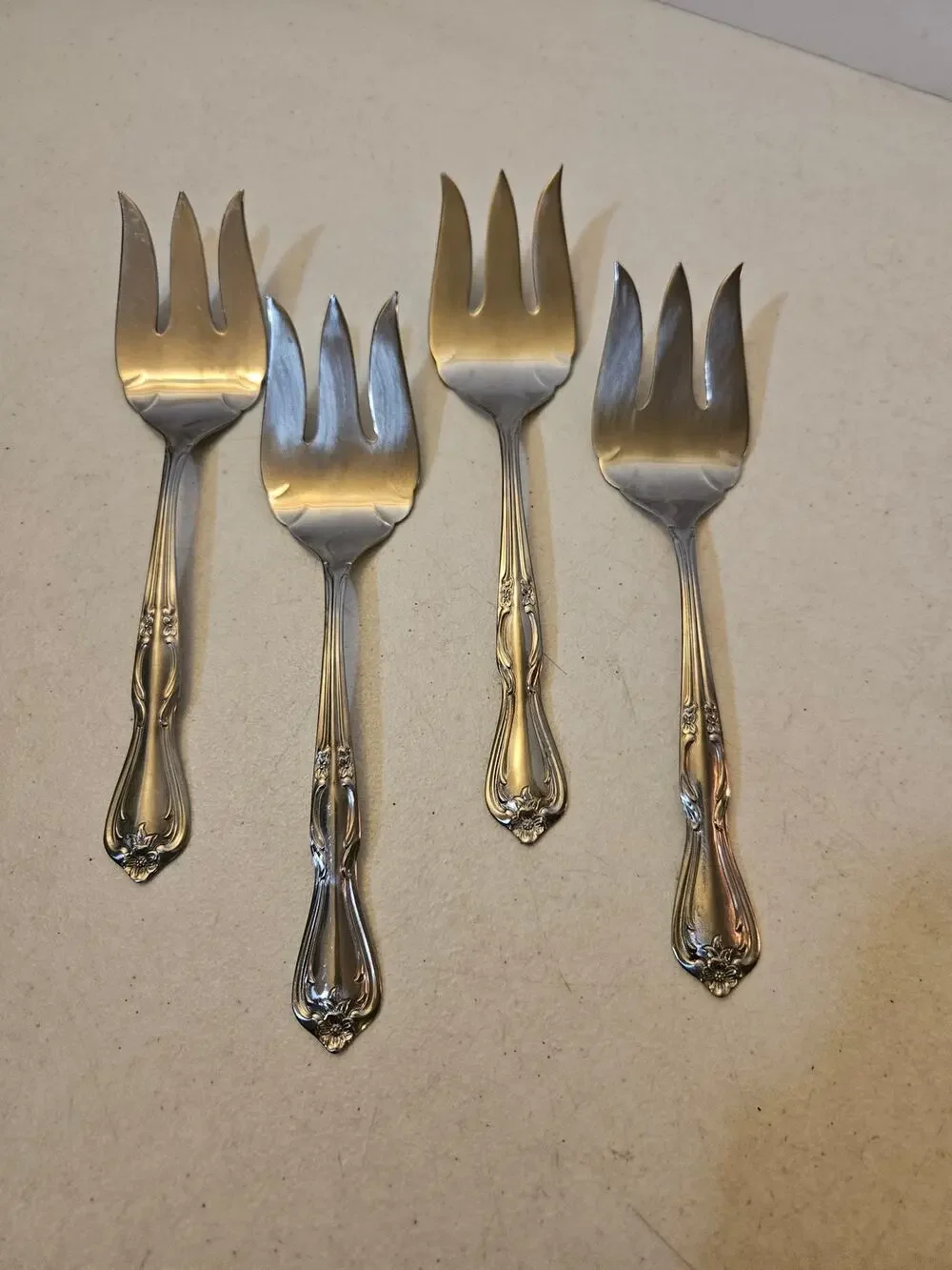 Lot of 4 stainless serving forks by International Silver Co floral flower design